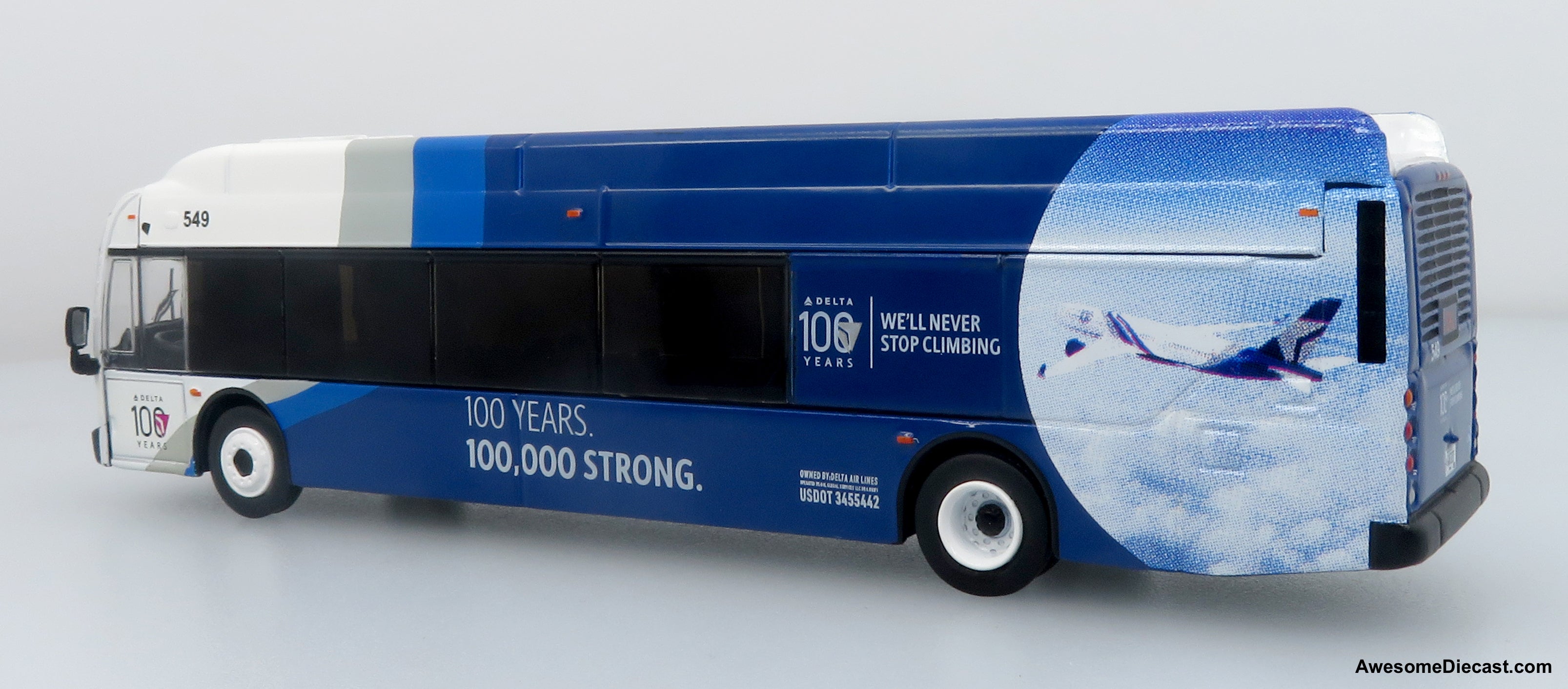 NFI Xcelsior XN40 Airport Crew Transit Bus: Delta 100th Anniversary 1:87 (HO) Diecast Model Bus by Iconic Replicas