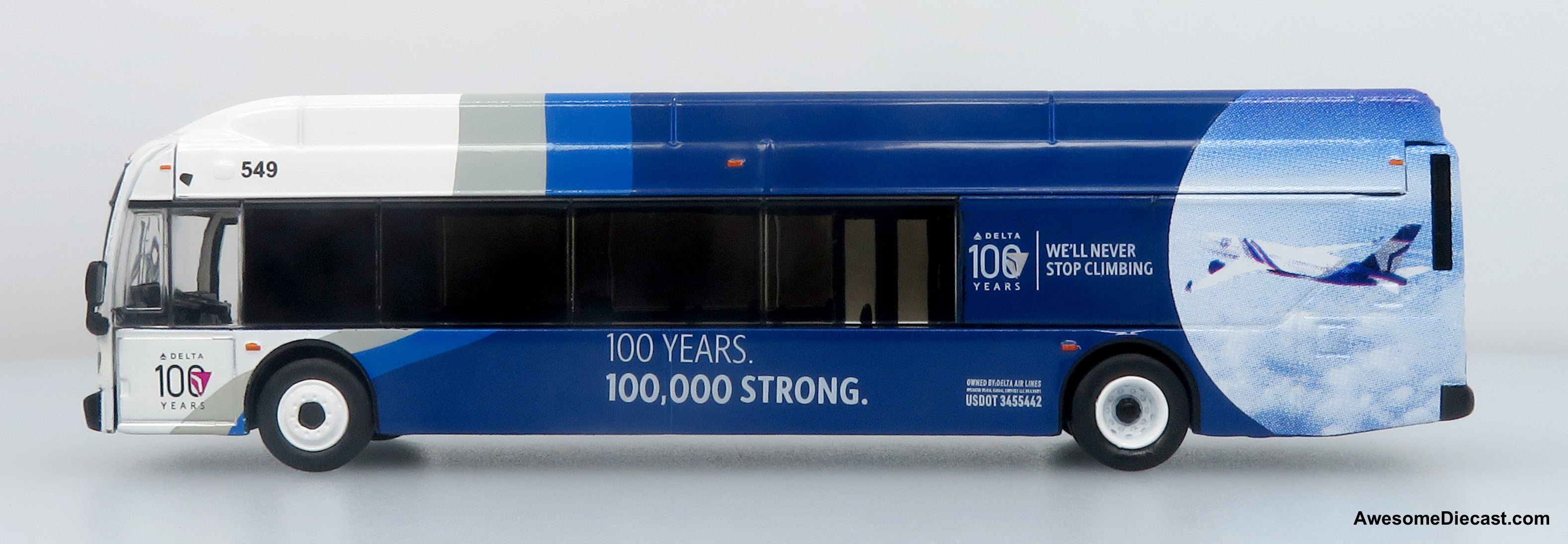NFI Xcelsior XN40 Airport Crew Transit Bus: Delta 100th Anniversary 1:87 (HO) Diecast Model Bus by Iconic Replicas