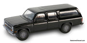 Greenlight 1:64 1985 Chevrolet Suburban C10 Custom Deluxe, Black