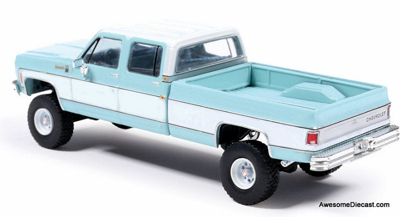 1978 Chevrolet Silverado K30 Crew Cab Fleetside Lifted Pickup Truck, Blue/White 1:64 Diecast Model Truck by IXO