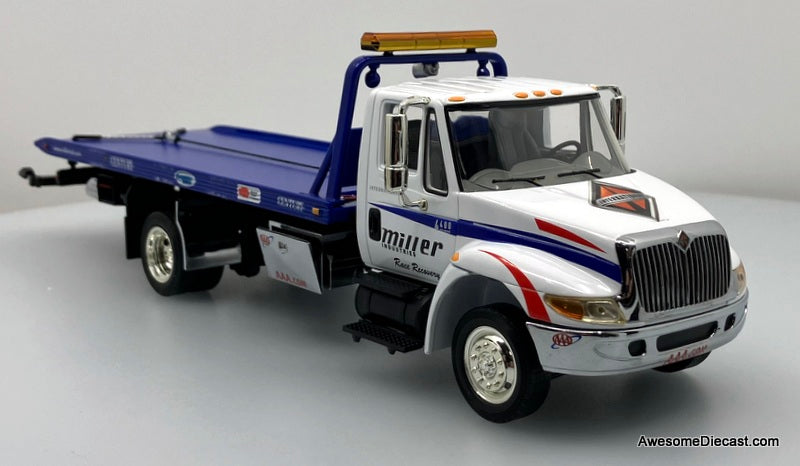 International 4400 w/Vulcan Slide Back: Miller Industries 1:34 Diecast Model Truck by First Gear