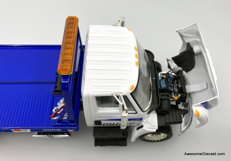 International 4400 w/Vulcan Slide Back: Miller Industries 1:34 Diecast Model Truck by First Gear