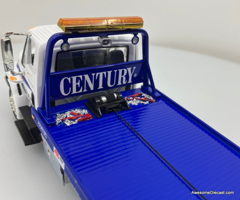 International 4400 w/Vulcan Slide Back: Miller Industries 1:34 Diecast Model Truck by First Gear