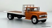 1963 GMC 4000 Single Axle Flat Bed, Orange 1:64 Diecast Model Truck DCP by First Gear