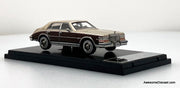 1980 Cadillac Seville Elegante, Brown/Gold 1:64 Diecast Model Car by Sun Star
